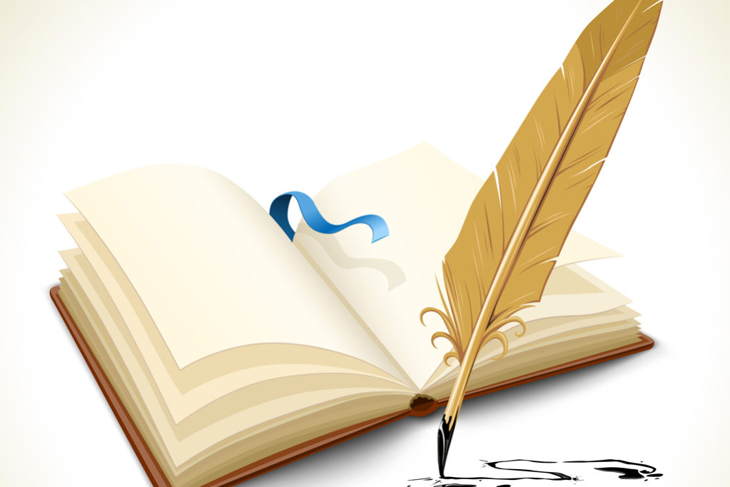 opened book with ink feather tool